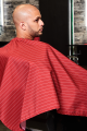 BSC13-REDWHT-The -Barber-Cape-Red-With-White-Pinstripe-Model-Image-2.png