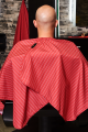 BSC13-REDWHT-The -Barber-Cape-Red-With-White-Pinstripe-Model-Image-1.png