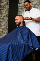 BSC14-BLEWHT-The -Barber-Cape-Red-With-White-Pinstripe-Model-Image-1.png